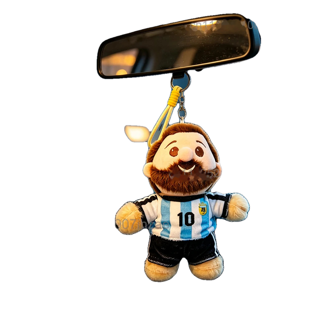 Lionel Messi plush keychain hanging from car mirror
